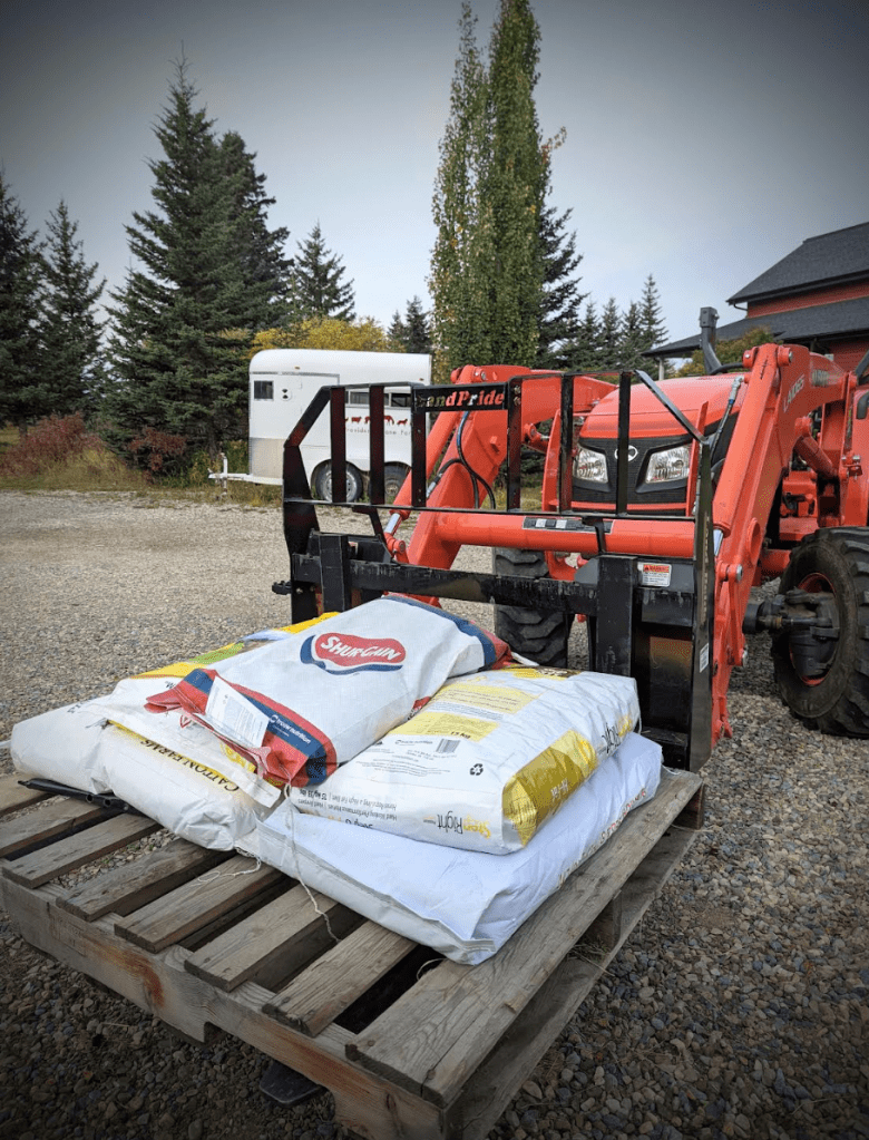 tractor loaded with feed bags